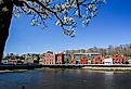 View from the Westport Bridge over Saugatuck River and architecture near downtown. Image credit Miro Vrlik Photography via Shutterstock.