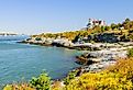 View of Castle Hill lighthouse, which has been guiding mariners into Narragansett Bay since 1890. Image credit solepsizm via Shutterstock.