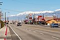 View of a street in Bishop, California with mountains in the backdrop. Editorial credit: 4kclips / Shutterstock.com