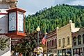 An antique clock showing time and temperature on the corner of a vintage building in the historic mining town of Wallace, Idaho, in the Pacific Northwest of USA. Editorial credit: Kirk Fisher / Shutterstock.com