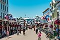 Mackinac Island, MI / USA - July 9th 2016: The busy streets of downtown Mackinac Island Michigan. Editorial credit: Michael Deemer / Shutterstock.com