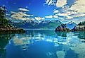 Prince William Sound, Valdez, Alaska. Reflection of clouds in the water with mountains in the background. Image credit Krishna.Wu via Shutterstock.