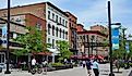 Ithaca, the home of Cornell University, has a lively downtown with shopping and restaurants, including this pedestrianized street. Editorial credit: Spiroview Inc / Shutterstock.com