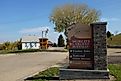 JAMESTOWN, NORTH DAKOTA - 3 OCT 2021: Sign at the entrance to Frontier Town, old style western town with original buildings from the frontier villages ...