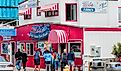 Tourist stand in front of Moe's seafood annex in downtown Newport. Editorial credit: Dee Browning / Shutterstock.com