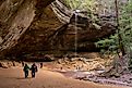 Tourists visit Ash Cave in the Hocking Hills State Park. Editorial credit: arthurgphotography / Shutterstock.com.