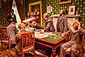 A depiction of President Abraham Lincoln convening his Cabinet to share his draft of the Emancipation Proclamation. Image credit Brett Welcher via Shutterstock