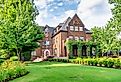 Cooper House on the campus of the University of Arkansas. Image credit Ken Wolter via Shutterstock.