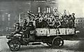 Truckload of excited soldiers during Russian Revolution. St. Petersburg, 1917.