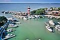 Aerial view of boats moored in the marina and a lighthouse on the pier in Harbor Town, Hilton Head Island, South Carolina. Editorial credit: Helioscribe / Shutterstock.com