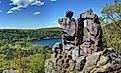 The iconic Devil's Doorway with Devil's Lake in the background in Devil's Lake State Park.