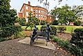 The "A Celebration of Reading Sculpture" by Branko Medencia that features the characters from Harper Lee's "To Kill a Mockingbird" in Monroeville, Alabama. Image credit VioletSkyAdventures via Shutterstock.