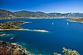 Yachts in Aegean sea near Poros, Greece. Image credit: S.Borisov/Shutterstock.com