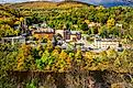 Aerial view of Jim Thorpe, Pennsylvania and surrounding Poconos Mountains during autumn.