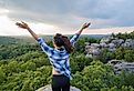 Woman enjoying the beautiful view of the Garden of Gods at Shawnee National Forest near Herod, Illinois