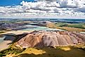 Mountains of potash salt products and artificial reservoirs near the city of Soligorsk, Belarus.