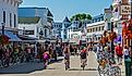 Crowded street view of Mackinack Island, Michigan during the busy tourist season. Editorial credit: Dennis MacDonald / Shutterstock.com