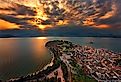 Panoramic view of Nafplio town and the Argolic gulf around sunset. Image credit Heracles Kritikos via Shutterstock. 