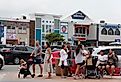 People gathered, eating ice cream in downtown Bethany Beach, Delaware. Image credit Khairil Azhar Junos via Shutterstock