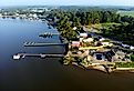 Aerial view of waterfront homes with a private dock near Millsboro, Delaware.