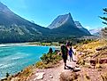 Visitors hiking in the Glacier National Park, Montana.