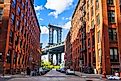 Iconic Manhattan Bridge and Empire State Building view from Washington Street in Brooklyn, New York