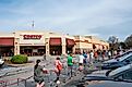 Shoppers waiting in line to get into a Costco store in Hoover, Alabama. Editorial credit: Cavan-Images / Shutterstock.com