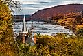 St. Peter's Roman Catholic Church in Harpers Ferry, West Virginia as it overlooks the Shenandoah River in the fall.