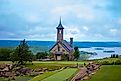 The Chapel of the Ozarks in the foreground at Top of the Rock in Branson, Missouri, with Table Rock Lake in the background