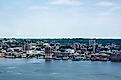 Wide view of the skyline of Yonkers with the Hudson River in the foreground. Editorial credit: Brian Logan Photography / Shutterstock.com