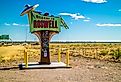 A welcoming signboard at the entry point of the town in Roswell, New Mexico. Image credit Cheri Alguire via Shutterstock