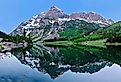 Maroon Bells peaks reflection in Crater Lake, Aspen, Colorado. Image credit Marina Poushkina via Shutterstock