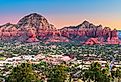 Sedona, Arizona, USA downtown cityscape and mountains. 