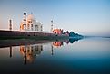 Sunrise at Taj Mahal in India on Jamuna River. Image credit Pius Lee via Adobe Stock.