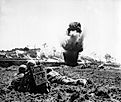 A U.S. Marine Corps demolition crew destroys a Japanese position during the Battle of Okinawa.