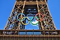 The Olympic rings installed on the Eiffel Tower for the Paris 2024 Olympics. Image by noriox via Shutterstock.com