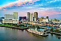 New Orleans, Louisiana, downtown skyline, along the river.