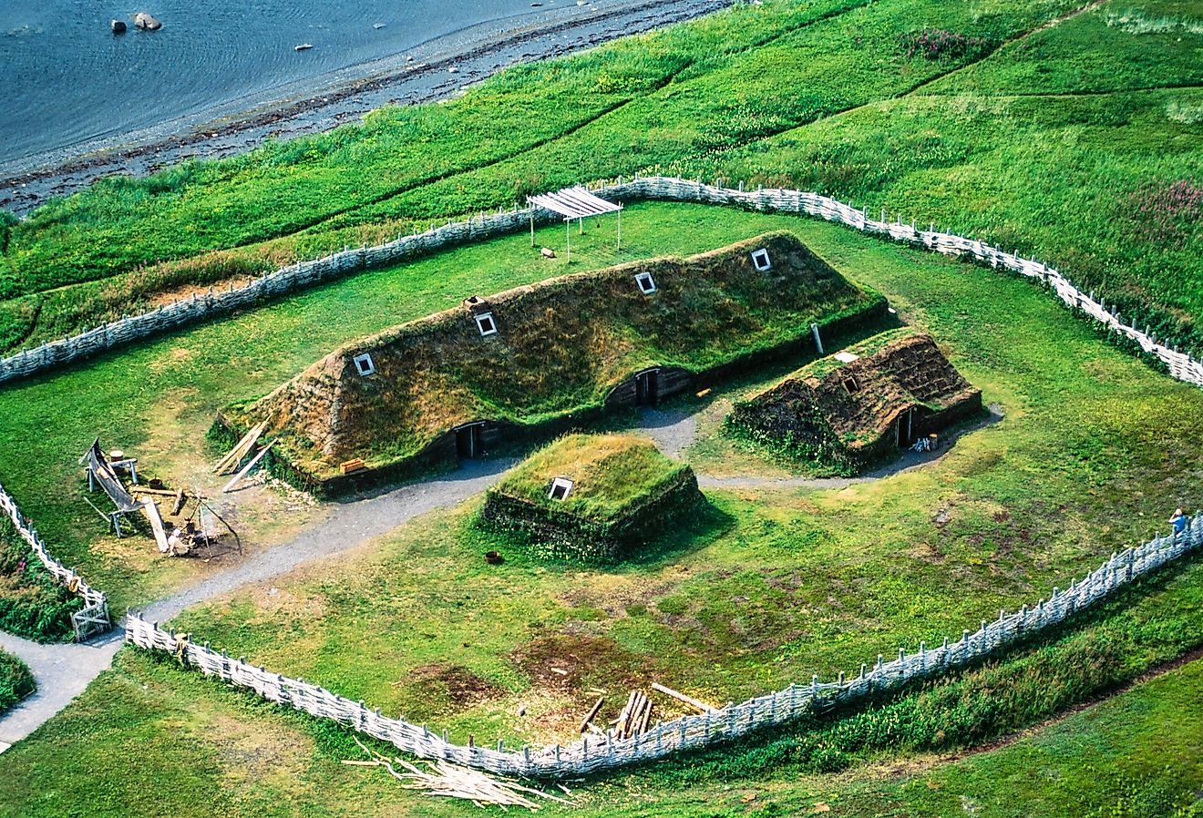  An aerial view of a reconstructed Norse settlement in Greenland, showing the impact of climate change on the landscape.