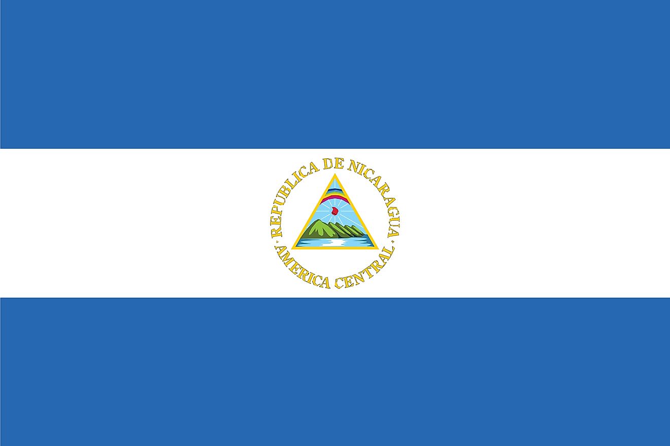The flag of Nicaragua is a bicolor with three horizontal bands of blue (top), white, and blue with the country’s National Coat of Arms centered on white.