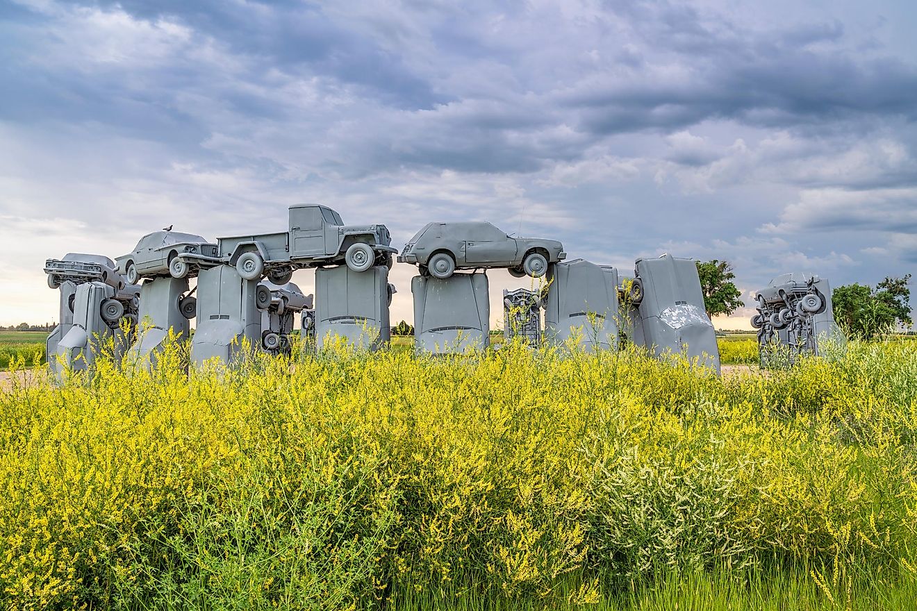 Carhenge with beautiful flowers near Alliance, Nebraska. Editorial credit: marekuliasz / Shutterstock.com