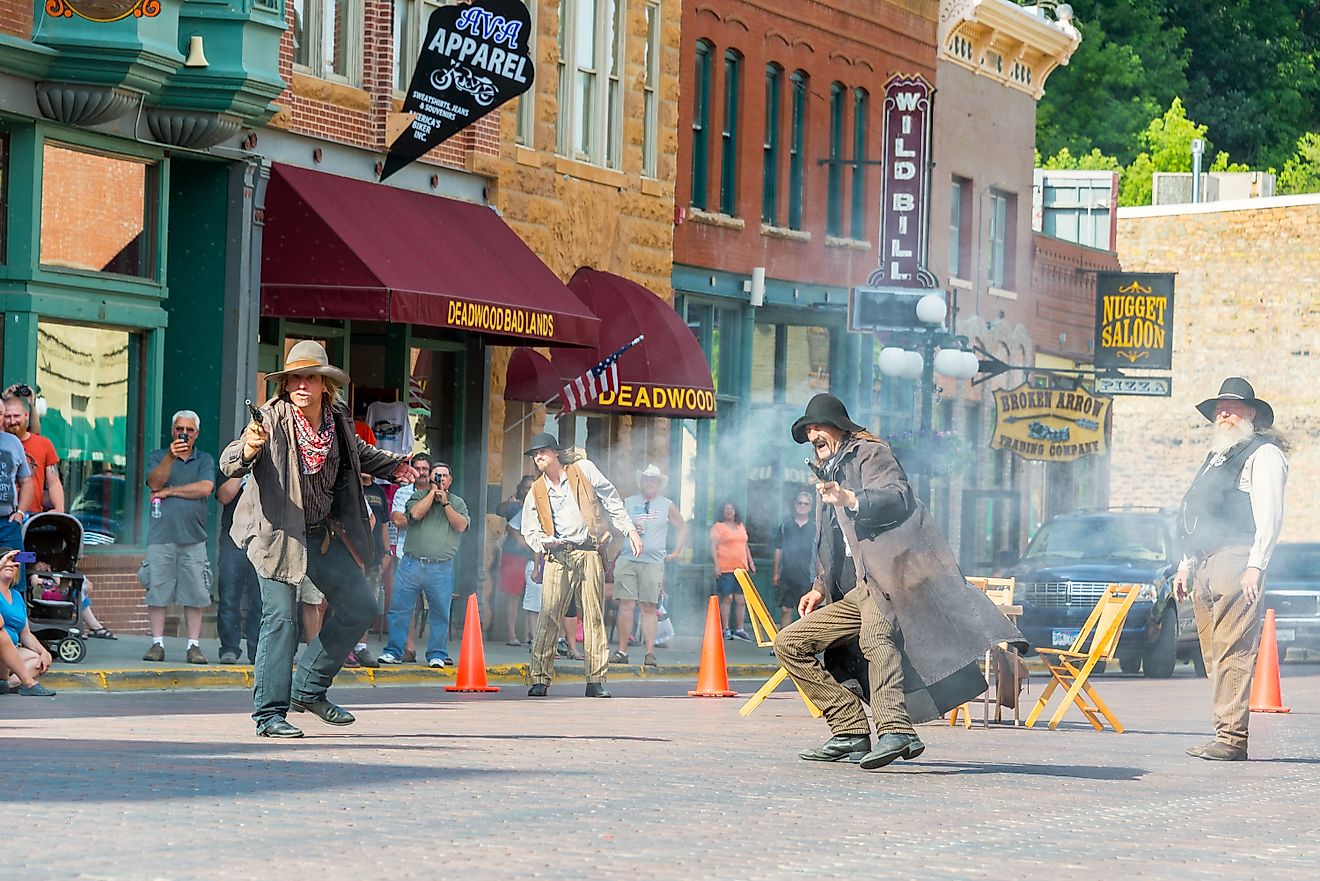 Actors reenact a historic gunfight in Deadwood, SD. Editorial credit: Jess Kraft / Shutterstock.com.