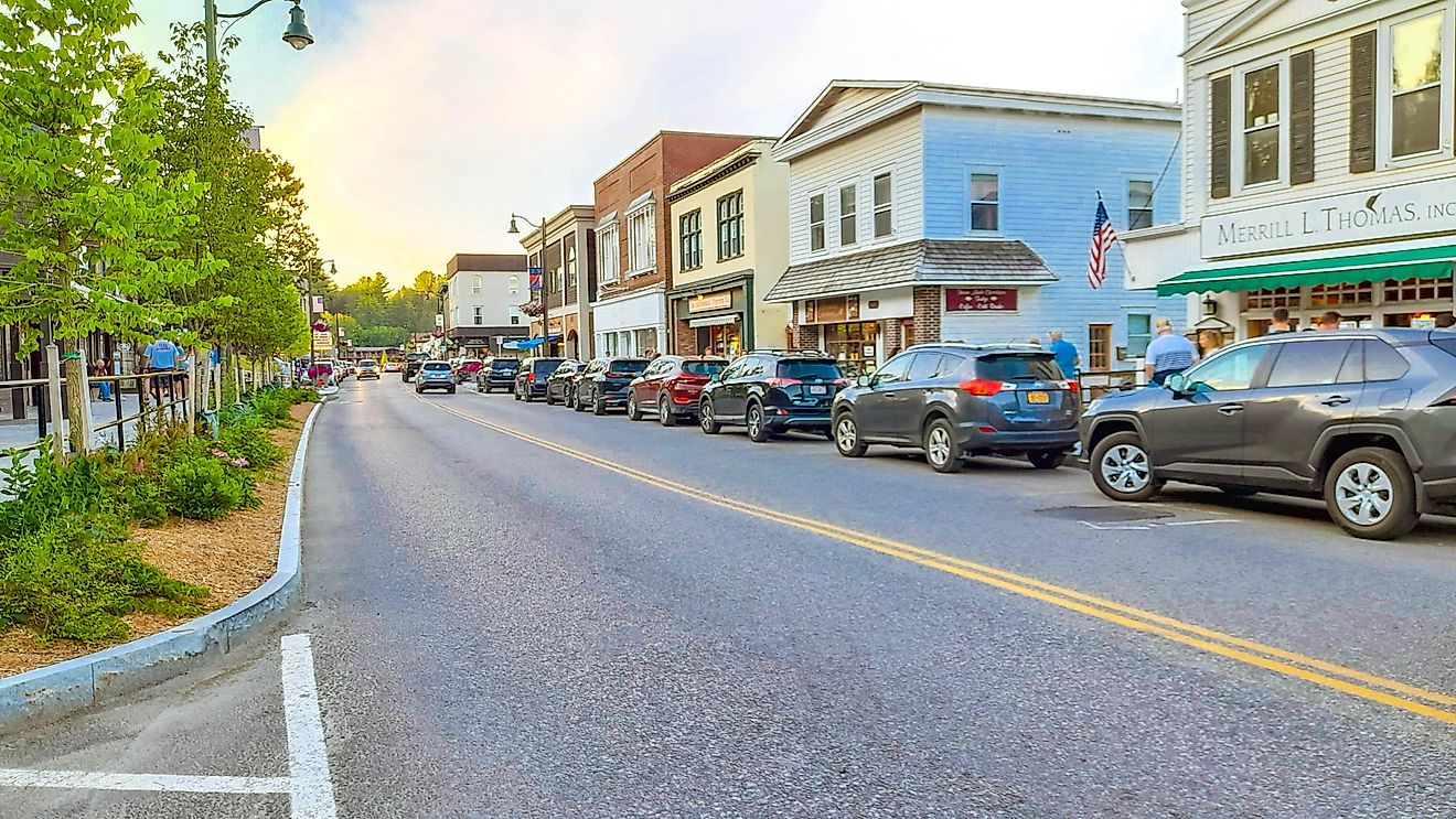 Cars and people in Lake Placid Main Street in New York State, via Arturo Rosenow / iStock.com