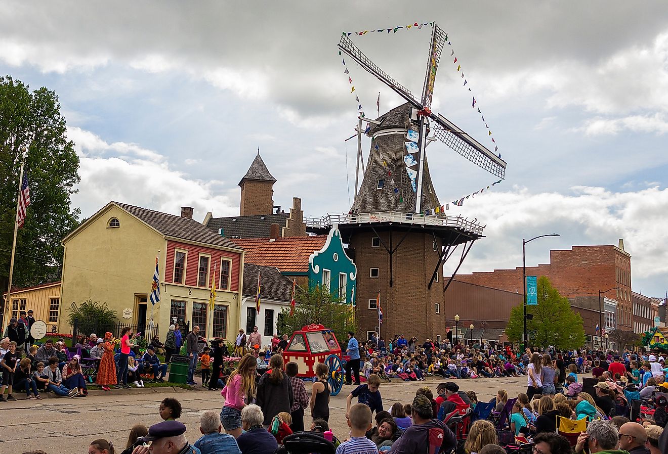 Downtown Pella, Iowa, during the Tulip Time Festival Parade. Image credit yosmoes815 via Shutterstock