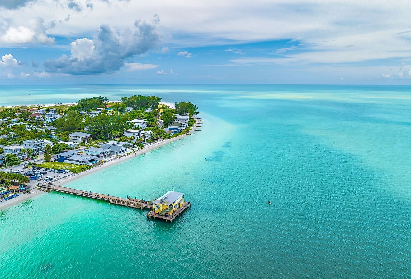 An aerial view of a fishing pier on Holmes Beach in Anna Maria Island Florida.