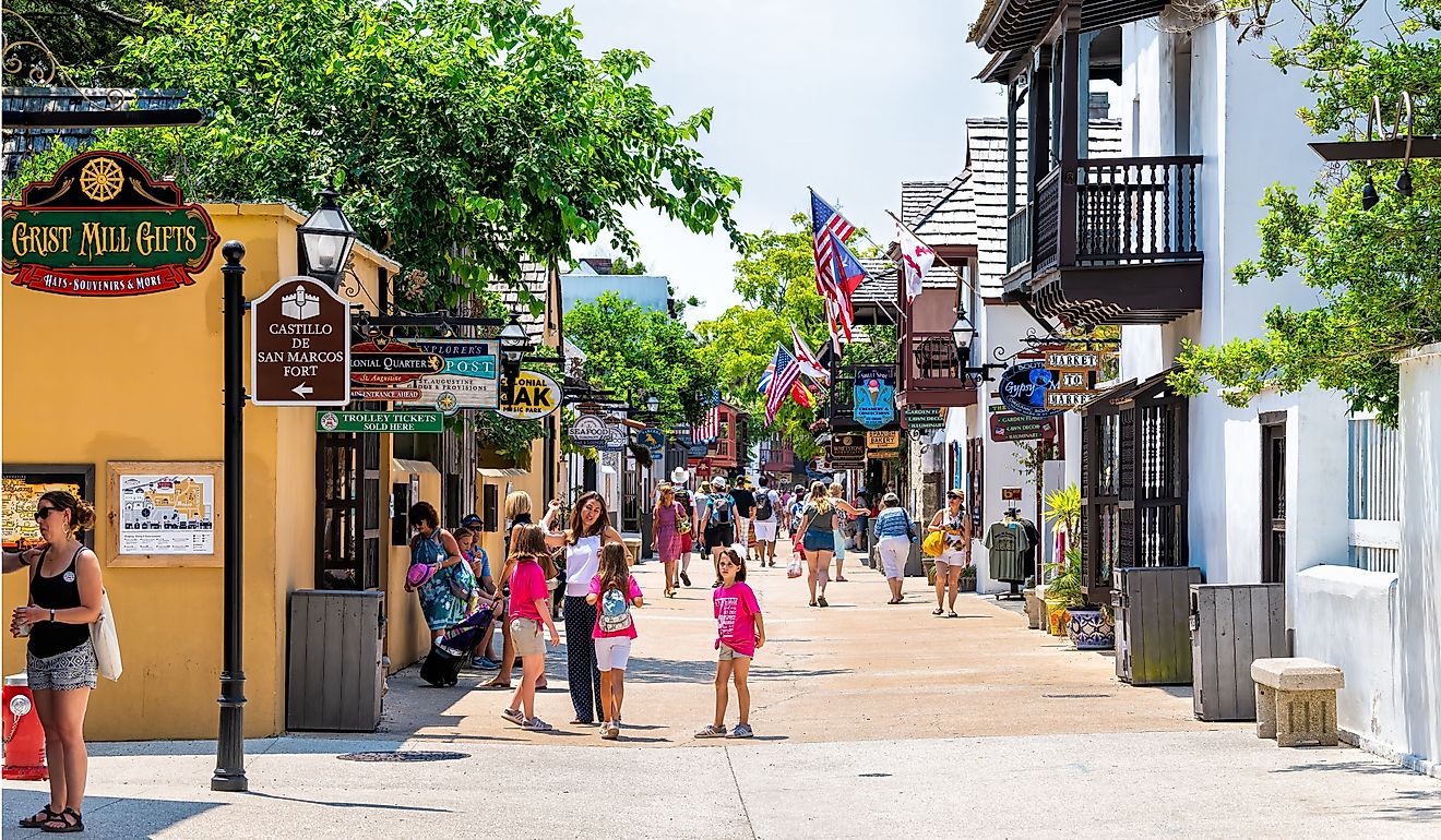 People walking and shopping at Florida city St George Street on summer day. Editorial credit: Andriy Blokhin / Shutterstock.com