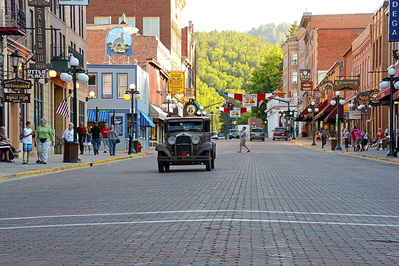 Vintage car approaching on Main Street in Deadwood, South Dakota. Editorial credit: Michael Kaercher / Shutterstock.com