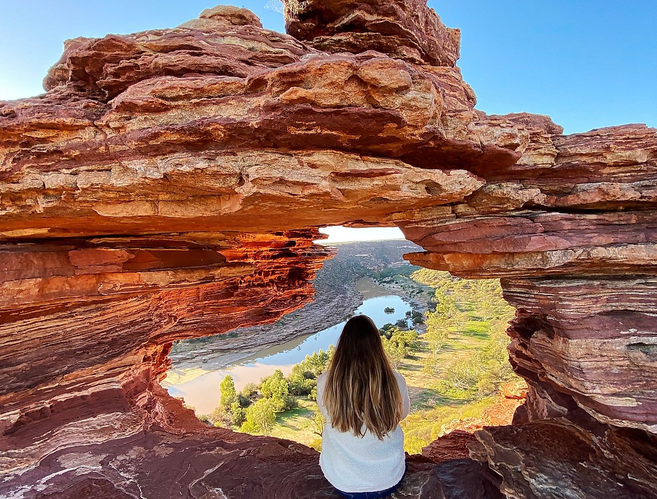 Hiking the stunning Natures Window in Kalbarri, National Park, Western Australia.