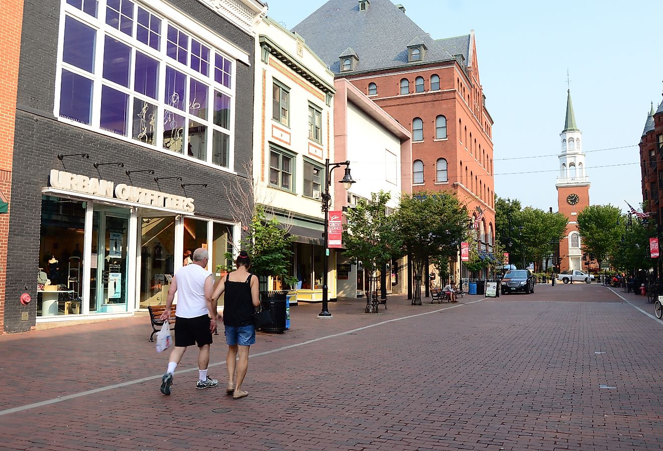 A couple enjoys an early morning walk though the business district of the Church Street Mall in Burlington, Vermont. Image credit James Kirkikis via Shutterstock