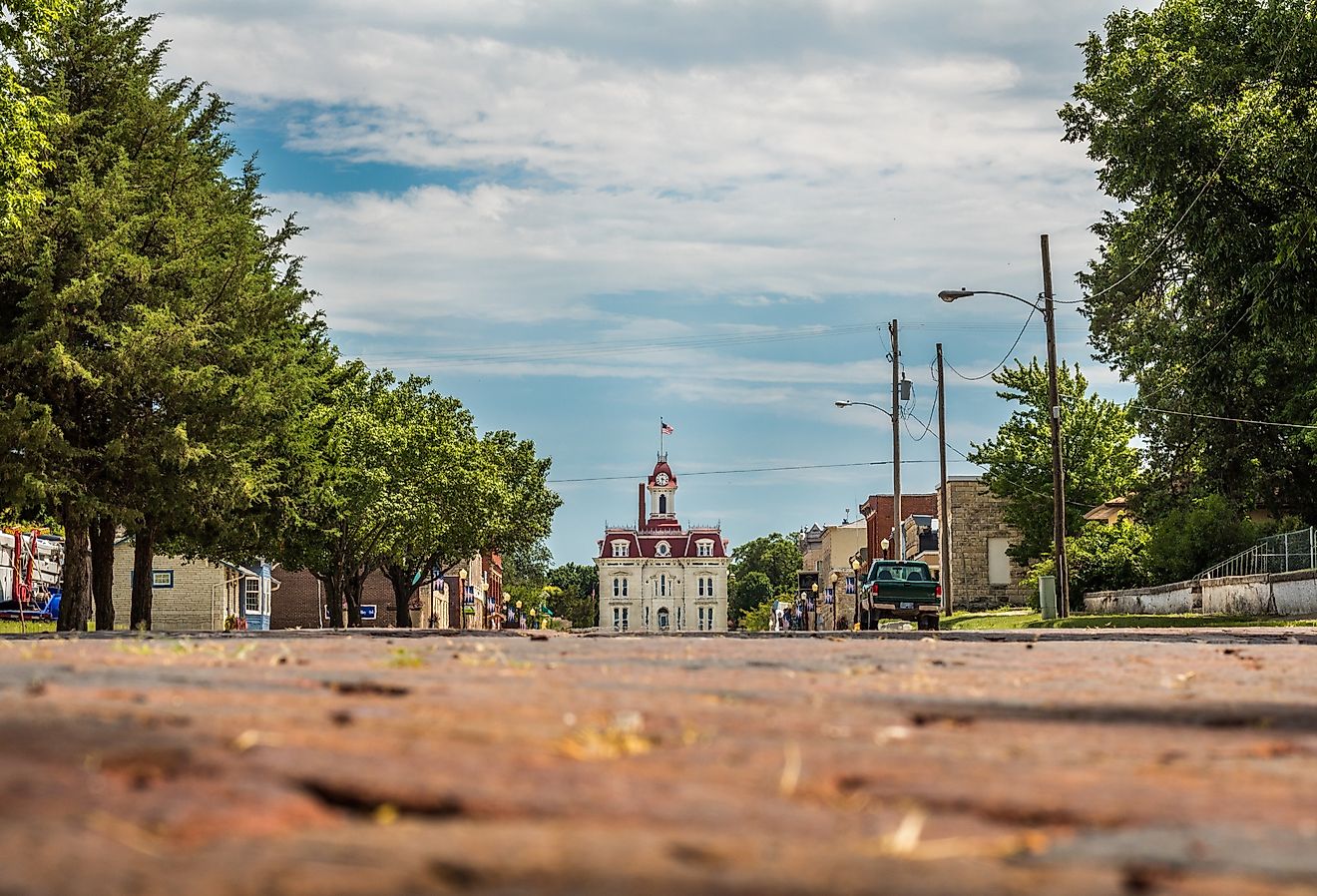 Old downtown area of Cottonwood Falls, Kansas with the courthouse at the end of the street.