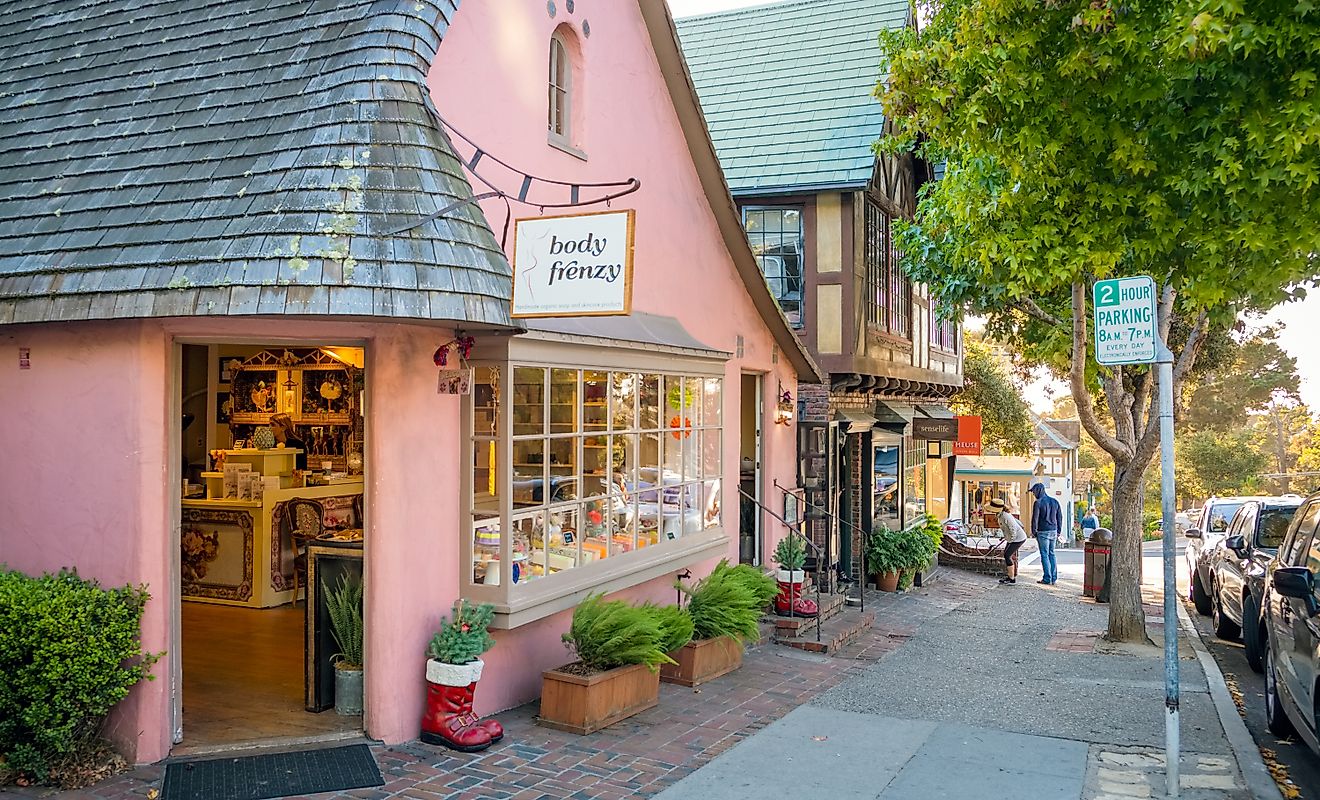 Cute stores lined along a sidewalk in Carmel-by-the-Sea, California. Editorial credit: Robert Mullan / Shutterstock.com